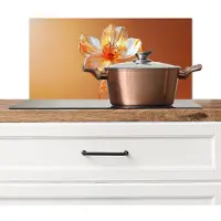 KitchenYeah Spatscherm keuken 60x30 cm - Kookplaat achterwand Glazen - Bloem - Oranje - Muurbeschermer - Spatwand fornuis - Hoogwaardig aluminium