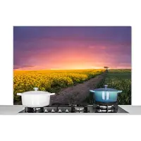 KitchenYeah Spatscherm keuken 120x80 cm - Kookplaat achterwand Bloemen - Weg - Lucht - Geel - Paars - Zonsondergang - Natuur - Muurbeschermer - Spatwand fornuis - Hoogwaardig aluminium