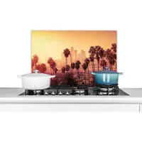 KitchenYeah Spatscherm keuken 70x50 cm - Kookplaat achterwand Palmboom - Skyline - Zonsondergang - Architectuur - Muurbeschermer - Spatwand fornuis - Hoogwaardig aluminium