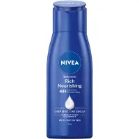 Nivea Verzorgende Body Milk - met Hyaluronzuur Zachte Amandel Olie en Voedend serum - Body Melk met 72 Uur Hydratatie - Voor Droge tot Zeer Droge Huid - 75 ml