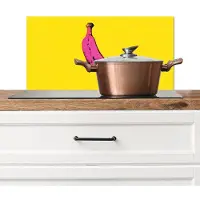 KitchenYeah Spatscherm keuken 60x30 cm - Kookplaat achterwand Banaan - Grafisch - Geel - Muurbeschermer - Spatwand fornuis - Hoogwaardig aluminium