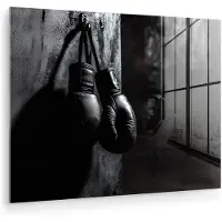 MuchoWow Glasschilderij 80x60 cm - Schilderij acrylglas - Bokshandschoenen - Muur - Duister - Zwart - Foto op glas - Muurdecoratie woonkamer - Wanddecoratie slaapkamer - Schilderijen