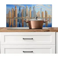 KitchenYeah Spatscherm keuken 90x45 cm - Kookplaat achterwand Skyline - Wolkenkrabbers - Water - Blauw - Muurbeschermer - Spatwand fornuis - Hoogwaardig aluminium
