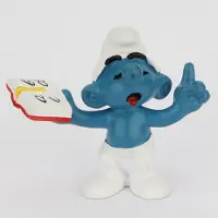 Schleich Leraar smurf / Docent smurf - Figuurtje - Met boek - Zanger smurf - 5,5 cm onderwijzer