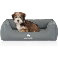 Knuffelwuff orthopedisch waterafstotend hondenbed Leon van velours met handgeweven karakter M-L 85 x 63cm petroleumkleurig