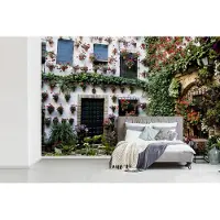 MuchoWow Behang - Fotobehang Kleurrijke binnenplein van Córdoba in Spanje - Breedte 450 cm x hoogte 300 cm