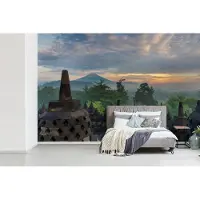 MuchoWow Behang - Fotobehang Zonsopgang bij de tempel Borobudur in Indonesië - Breedte 450 cm x hoogte 300 cm