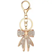 Yehwang Bagcharm - sleutelhanger - tashanger - charm - bedel - strik met steentjes - goud kleur met witte steentjes - bow - cadeau