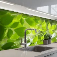 KitchenYeah Keuken achterwand 150x80 cm - Spatscherm zelfklevend Natuur - Lente - Groen - Bladeren - Muurbeschermer - Spatwand fornuis