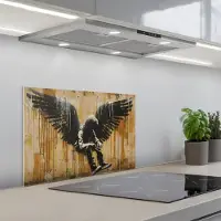 KitchenYeah Spatscherm 60x40 cm - Zelfklevende achterwand Graffiti - Kunst - Vleugels - Street art - Banksy Style - Keuken muurbeschermer - Spatwand fornuis