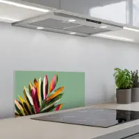 KitchenYeah Spatscherm 60x30 cm - Zelfklevende achterwand Bladeren - Tak - Kleurrijk - Keuken muurbeschermer - Spatwand fornuis