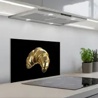 KitchenYeah Spatscherm 60x40 cm - Zelfklevende achterwand Croissant - Brood - Goud - Zwart - Keuken muurbeschermer - Spatwand fornuis
