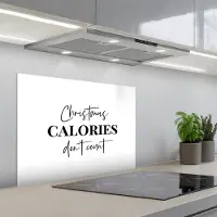 KitchenYeah Spatscherm 70x50 cm - Zelfklevende achterwand Kerst quote - Winter - Christmas calories - Wit - Keuken muurbeschermer - Spatwand fornuis