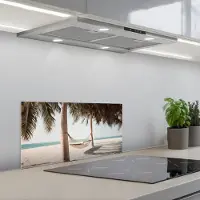 KitchenYeah Spatscherm 70x30 cm - Zelfklevende achterwand Hangmat - Palmbomen - Strand - Zee - Keuken muurbeschermer - Spatwand fornuis
