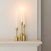 Atmooz Orso kaarshouder - set van 3 – goudkleurig metaal – luxe kandelaars – decoratieve kaarsenhouders in drie hoogtes – stijlvolle woonaccessoire – elegante gouden kaarshouders