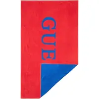 GUESS Raad eens? De man met de strandhanddoek reist