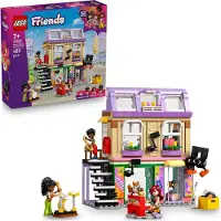 LEGO Friends 42653 Winkel met de Hudebninami en een aankoop