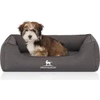 Knuffelwuff orthopedisch waterafstotend hondenbed Leon van velours met handgeweven karakter M-L 85 x 63cm antraciet