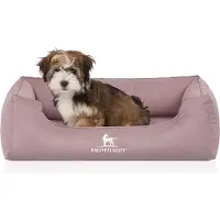 Knuffelwuff orthopedisch waterafstotend hondenbed Leon van velours met handgeweven karakter M-L 85 x 63cm roze