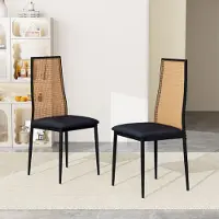 ProximaX Elegante eettafelstoel in zwart met rieten vlechtwerk – een moderne en tijdloze designstoel gemaakt van duurzaam materiaal, ideaal voor eetkamers, keukens of cafés