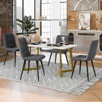 MODFU eetservies, 5-delig, bestaande uit een eettafel met 4 stoelen. De stoelen zijn bekleed, hebben een marmeren blad en een metalen frame, en zijn grijs van kleur