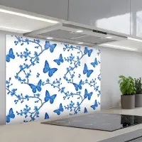 KitchenYeah Spatscherm 90x60 cm - Zelfklevende achterwand Vlinder - Bloemen - Blauw - Keuken muurbeschermer - Spatwand fornuis
