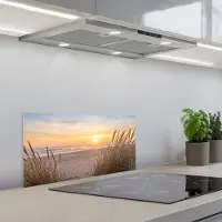 KitchenYeah Spatscherm 60x30 cm - Zelfklevende achterwand Zonsondergang - Duinen - Zee - Keuken muurbeschermer - Spatwand fornuis