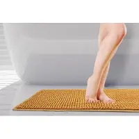 Unyqoos Zachte Antislip Badmat in Okergeel - Comfort en Veiligheid voor de Badkamer