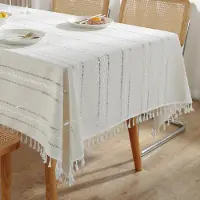 Unyqoos Elegant ivoorwit tafelkleed met kwastjes voor sfeervolle eetkamerdecoratie