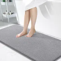 Unyqoos Zachte en absorberende badmat met antisliplaag voor badkamercomfort