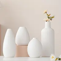 Unyqoos Set van vier moderne witte vazen voor stijlvolle interieurdecoratie