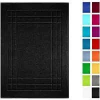 Unyqoos Zwarte katoenen badmat 50x70 cm voor moderne en comfortabele badkamer