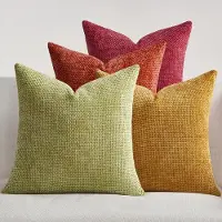 Unyqoos Set van 4 decoratieve kussenslopen in geel en oranje met geweven design