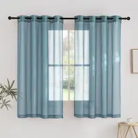 Unyqoos Linnenlook blauwe voile gordijnen set met ringen voor sfeervol interieur
