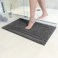 Unyqoos Donkergrijze badmat met antislip voor veiligheid en comfort in de badkamer