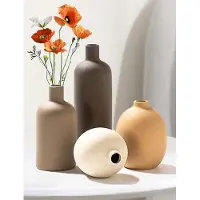 Unyqoos Set van vier keramische vazen voor stijlvolle decoratie van tafel en plank