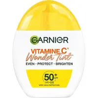 Garnier Vitamine C* Wonder Tint SPF 50+ medium - Beschermt & Laat stralen - getinte fluid met lichtgewichte dekking - 40ml