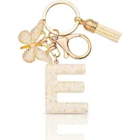 JeiibrZui ModeAccessoires Vlinder Collectie Sleutelhanger Met Letter - 26 Opties - 1 Stuk Personaliseerbaar Accessoire - Goud Met Kwastje Voor Dames En Meisjes