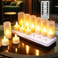 Aurae Oplaadbare Led Waxinelichtjes 12x – Theelichtjes met Afstandsbediening – Flikkerende Vlam – Warm Wit – Ø5.5x3.9 cm – Inclusief Oplaadstation