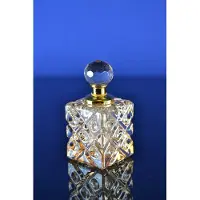 Nee Luxe Kristallen Parfumflesje met Gouden Details