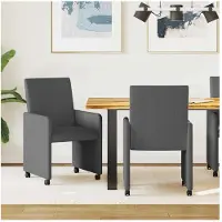 vidaXL Eetkamerstoelen met wielen 2 st Katoenen stof Donkergrijs