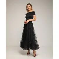 Tantra Tule midi-rok met kant aan de onderkant en strikdetails.