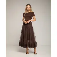 Tantra Tule midi-rok met kant aan de onderkant en strikdetails.
