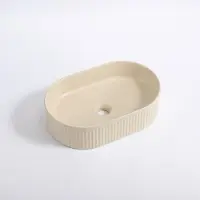 Qeramiq Arto waskom - 49.5x31.5x13cm - geribbeld - ovaal - keramiek - mat beige SW1413967
