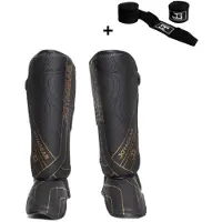 Joya ESSENTIAL Scheenbeschermers – Maat S – Zwart/Goud – Kickboksen/Muay Thai/MMA – Ergonomische pasvorm, schokabsorberende padding – Inclusief Bandage