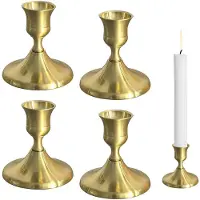 Unyqoos Elegante metalen kandelaar set in gouden afwerking voor sfeervolle decoratie
