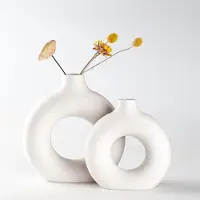 Merkloos Set van 2 witte keramische vaasjes in de vorm van een donut, ideaal voor moderne decoratie