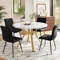 Sonstiges Eetset bestaande uit een eettafel met 4 stoelen, rond, afmetingen 100x100x75 cm, met goudkleurige metalen poten en zwarte fluwelen bekleding